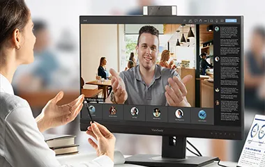 Doctor speaking to patient remotely using a ViewSonic monitor with built in camera
