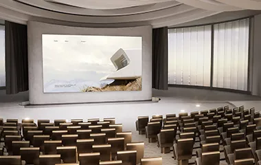 Large auditorium with a large display in front of the room used to display content