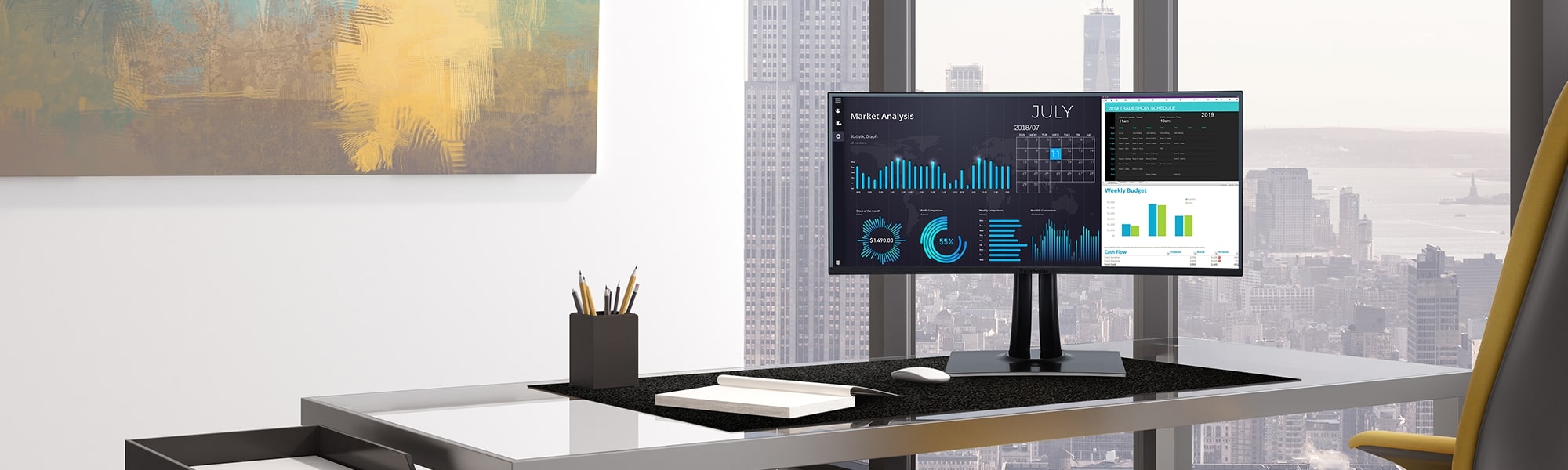 an ultrawide monitor on the desk in an executive office