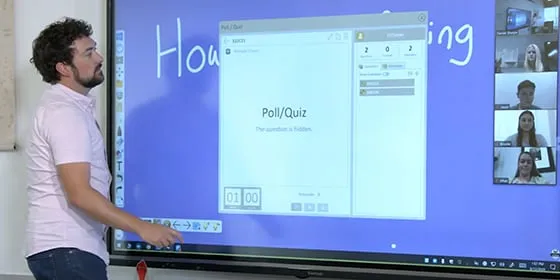 man posting a poll or quiz on a ViewBoard to remote students