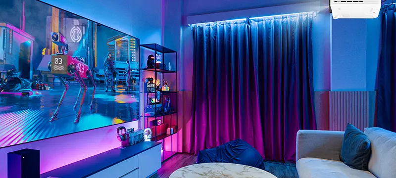 large screen on the wall with a game being projected by a ViewSonic gaming projector