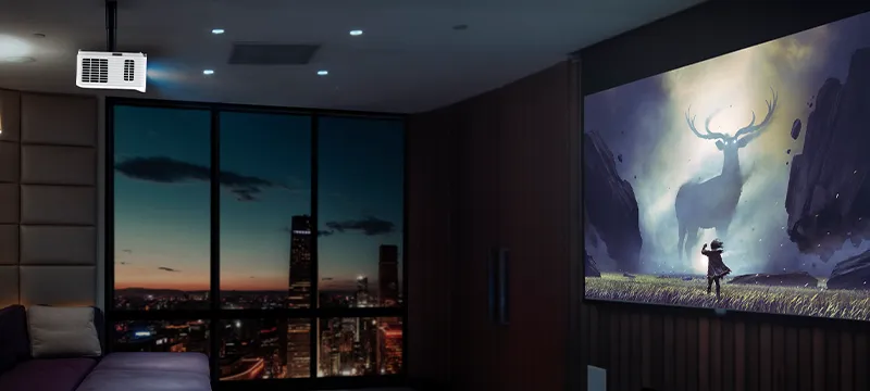 a home theatre with a projector hanging from the ceiling